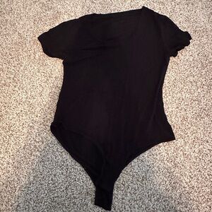 Women black body suit short sleeve. Size is a medium. Brand is target.